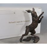 A bronze boxing hare 9cm high, limited edition 98/250 by Richard Cooper & Co with original box