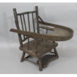 Low wooden vintage chair with hinged tray and painted finish, height 43cm