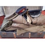 Vintage trunk containing a large collection of 1940's-1950's Army battledress uniform