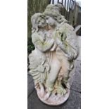 A weathered cast composition stone garden figure group of romantic couple 72 cm high