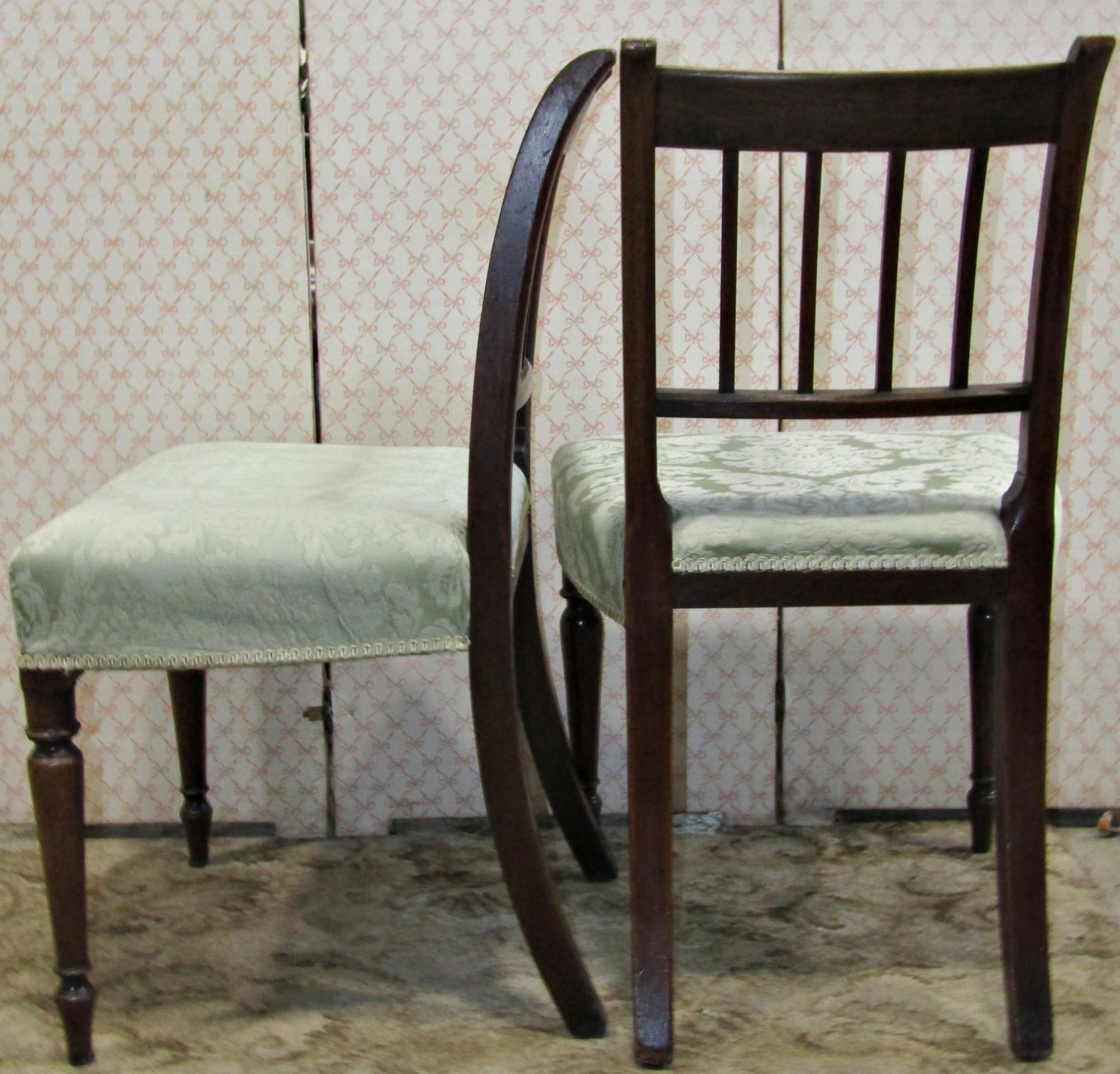 A set of six Regency mahogany dining chairs with reeded stick backs over upholstered seats raised on - Image 2 of 2