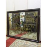 A large old pub mirror, 'Charington Celebrated Ales,' set within a moulded pine frame, 100cm x 120cm