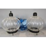 A pair of gourd shaped glass hanging lanterns. (Finial missing to one)