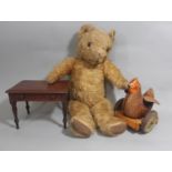 Vintage toy collection including a tin plate mechanical push along hen, a Pedigree teddy bear with