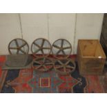A vintage agricultural plough attachment together with five small iron five spoke wheels, 30 cm in