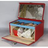 A mid 20th century 'Leichner' portable, make up artist's box with a selection of lipsticks, leg make