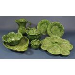 A collection of Portuguese leaf moulded wares comprising a sectional serving dish, a tureen and