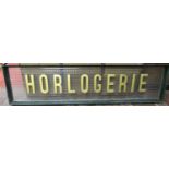 A large French shop panel, the letters Horlogerie in gilt block (watch making or Horology) mounted