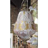 A continental designed hanging lantern with opaque white shade and applied gilt decoration and a