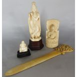 A late 19th century Indian ivory figure of a musician, further carved figure of a buddha, letter