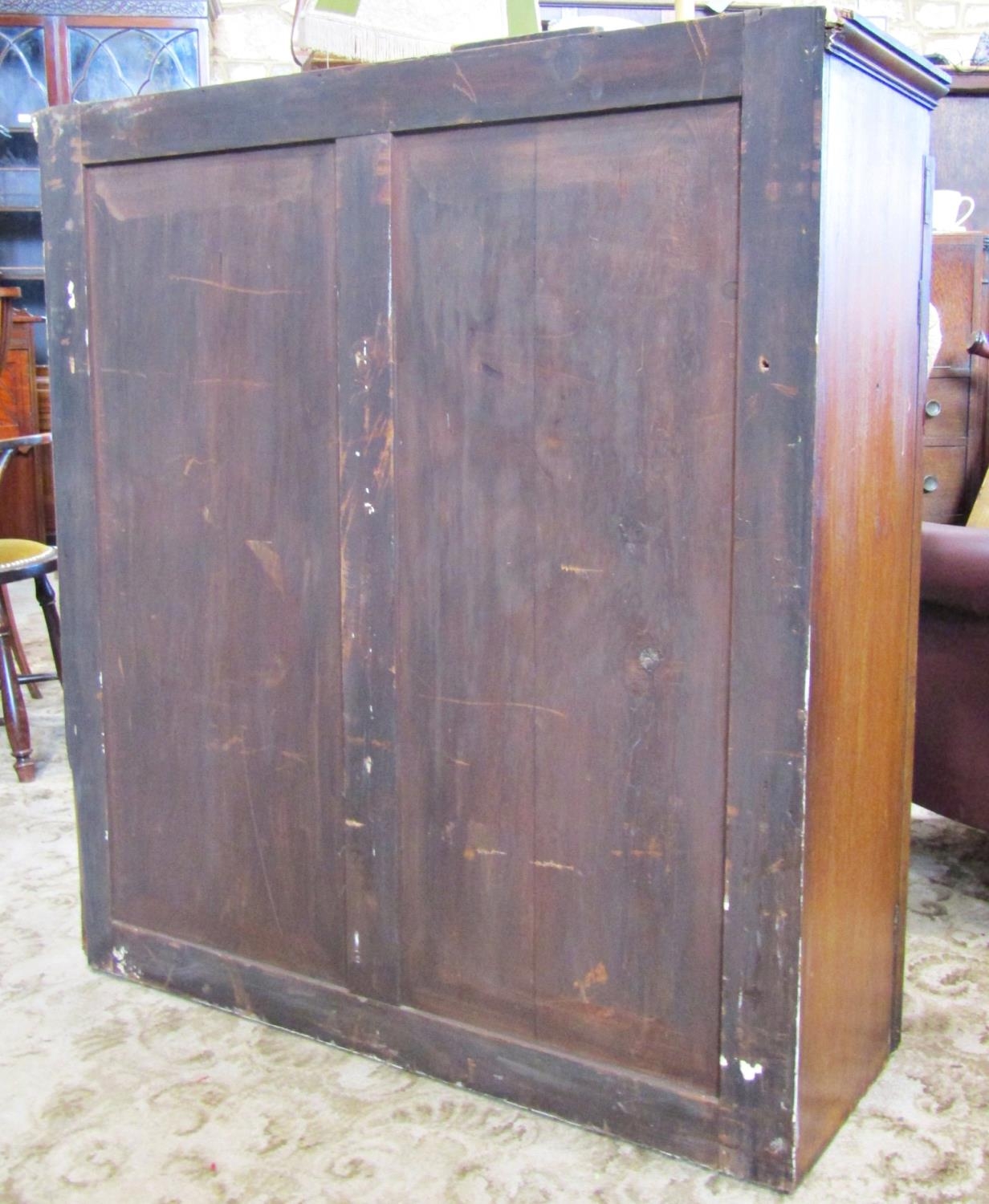 A 19th century mahogany side cupboard enclosed by a pair of well matched flame veneered - Image 3 of 3