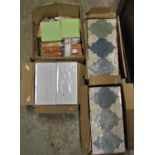 A quantity (2 boxes) of Mainzu ceramic repeating patterned tiles, 30 cm x 15 cm, together with