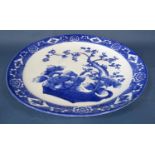 An oriental charger with blue and white painted prunus blossom decoration, 46cm diameter approx