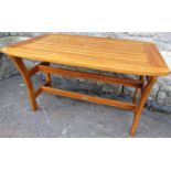 A pagoda low contemporary hardwood garden table of rectangular form with slatted top and rose