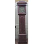 A Georgian oak longcase clock the trunk with full length door enclosing a square brass dial with