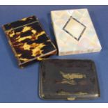 A 19th century mother of pearl card case with geometric panels and a further tortoiseshell example