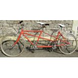 A vintage Sun tandem with tubular frame and orange painted livery (Donated by a local gentleman