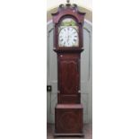A Regency mahogany longcase clock, the case with reeded and canted corners and inlaid detail, the