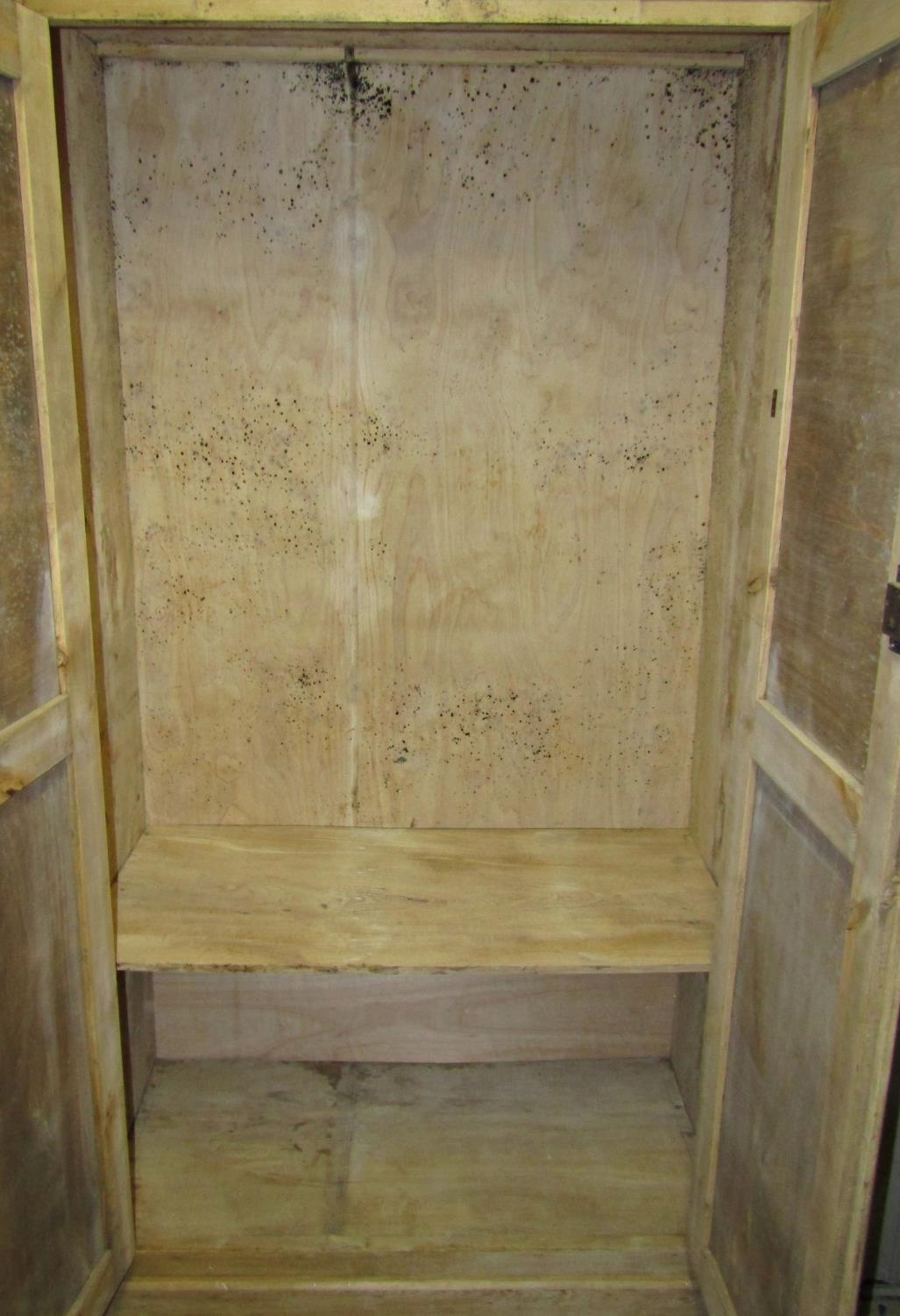 An antique stripped pine floorstanding side cupboard enclosed by a pair of full length plywood - Image 2 of 2