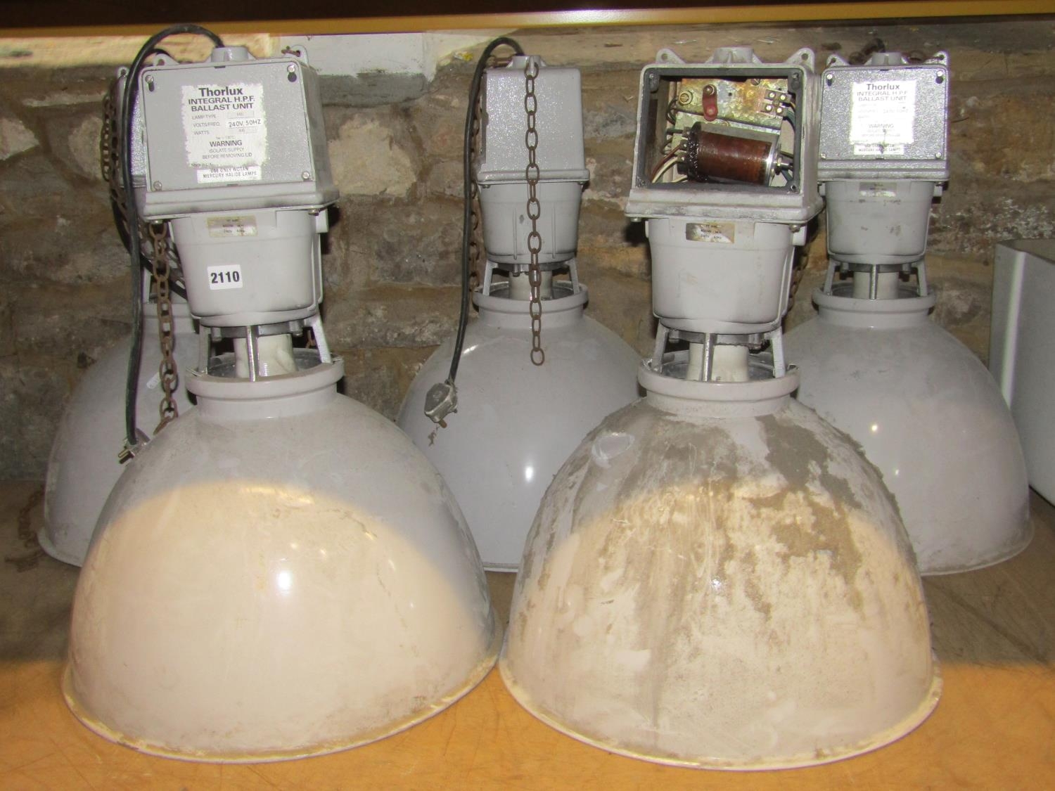 Five industrial hanging ceiling/pendant lights with conical shades and Thorlux integral H.P.F.