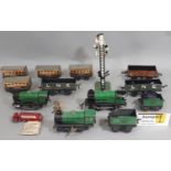 Large collection of 0 gauge Hornby railway items including three 0-4-0 clockwork locomotives,