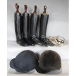 Two pairs of black leather riding boots, size 9 both with wooden trees, two riding hats, a single