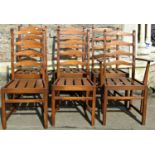A set of six (5&1) Ercol stained elm wavy ladderback dining chairs with slatted seats, raised on