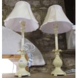 A pair of slender table lamps with a pine cone base and a flared sconce, with shades. 50cm high.