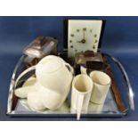 An Art Deco Ercuis silver plated three piece tea service with rosewood handles and matching tray (
