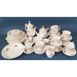 A collection of Royal Albert tea and coffee wares in the Tranquillity pattern comprising teapot,