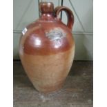 An early 19th century salt glazed flagon incised 140 I Spier