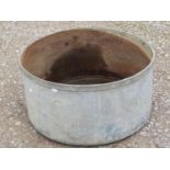 A vintage heavy gauge galvanised steel squat cylindrical planter/vessel with riveted rim, 673 cm