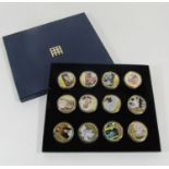 Eleven Diamond Jubilee medallions 2012, gold plated enamelled, together with a Cook Islands one