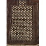 A Meshed Baluchi prayer mat, with repeating geometric black and brown pattern, 134cm x 94cm