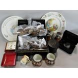 A miscellaneous collection of items including a money box, bags of old copper pennies, half pennies,