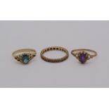 Three 9ct gem set rings to include an amethyst example, sizes M/N - Q, 5.2g total (3)
