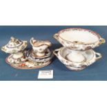 A collection of 19th century Ironstone tablewares comprising a large soup tureen, stand, cover and