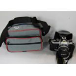 Nikon FE2 SLR film camera C/W Nikkor 50mm/f1.8 AIS lens in photo carry bag