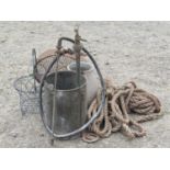 A vintage stirrup pump with galvanised bucket, a milk pail with loose loop handle, wire work basket,