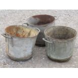 A set of three vintage heavy gauge and weighted galvanised steel two handled circular buckets/