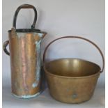 A 19th century heavy duty brass preserving pan with iron strap handle, 30cm diameter and a 19th