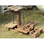 A Bartlett Bristol cast iron sack scale with elm boards to weigh 3 CWT, together with a selection of