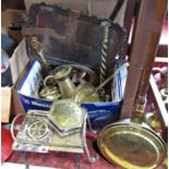 An assortment of mostly brass items including, a kettle stand, fire dogs, pitcher, chestnut roaster,