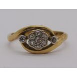 18ct diamond daisy crossover type ring, size L, 2.8g