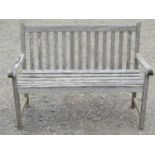Weathered teak two seat garden bench with slatted seat and back, 125cm wide (af)