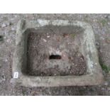 A weathered shallow natural stone trough of rectangular form 53 cm long x 45 cm wide x 17 cm high