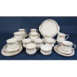 A collection of Royal Albert Belinda pattern teawares comprising milk jug, sugar bowl, cake plate,