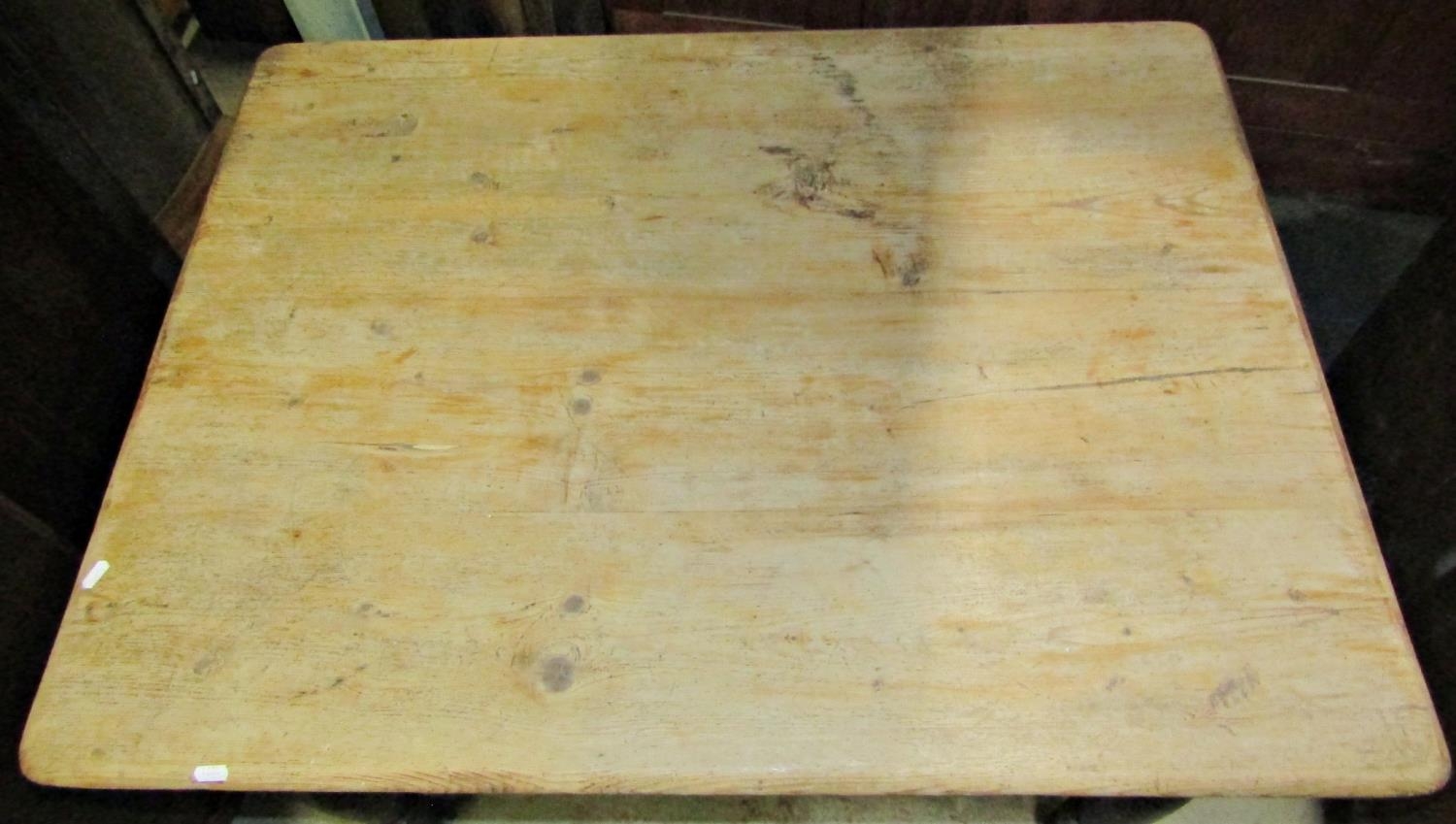 A pine kitchen table with scrub top on four turned supports, 105 cm wide - Image 2 of 2