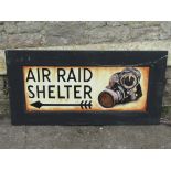 An 'Air Raid' shelter sign (hand painted on fibre board) 97cm x 50cm