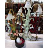 Two Lily Lamps, one in pastel shades of pink and green , the other in shades of green and white,